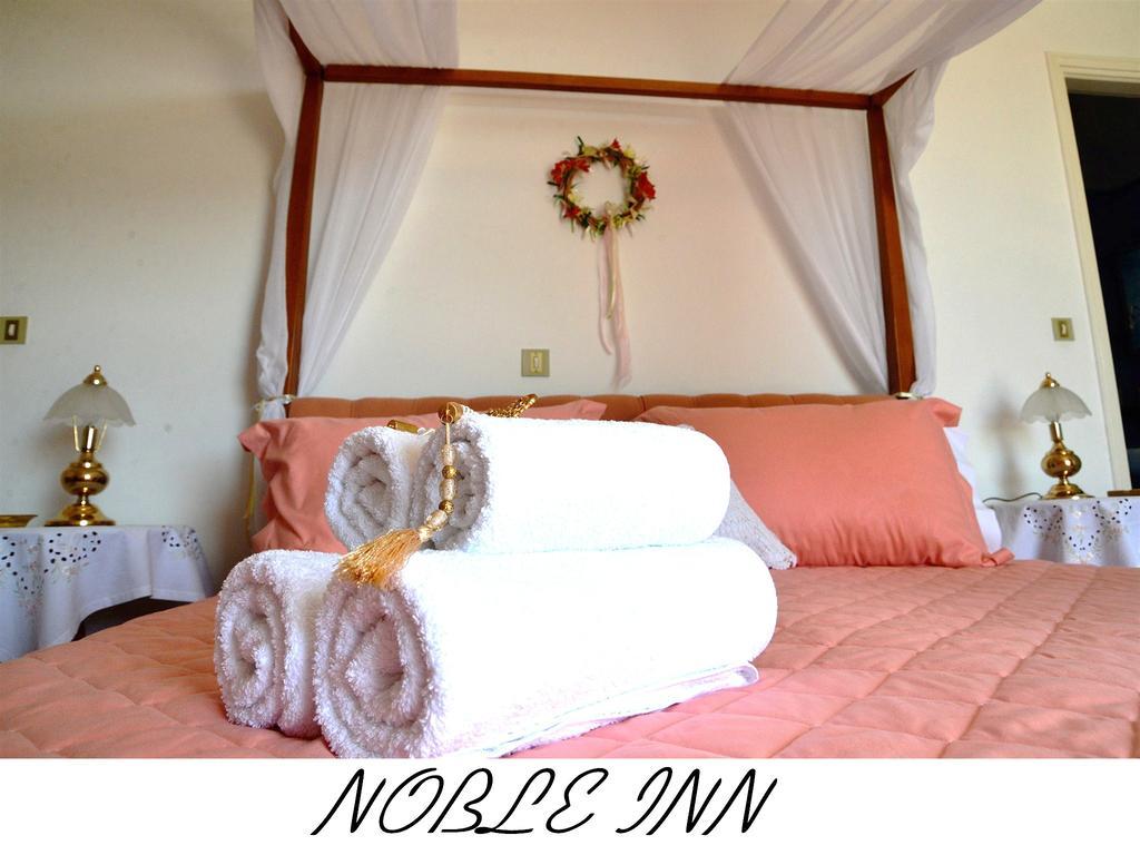 Noble Inn Loutráki Rum bild